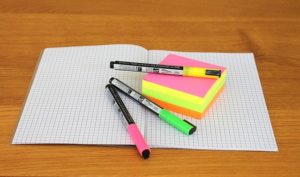 notebook and highlighters