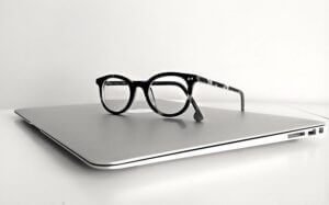 macbook and glasses